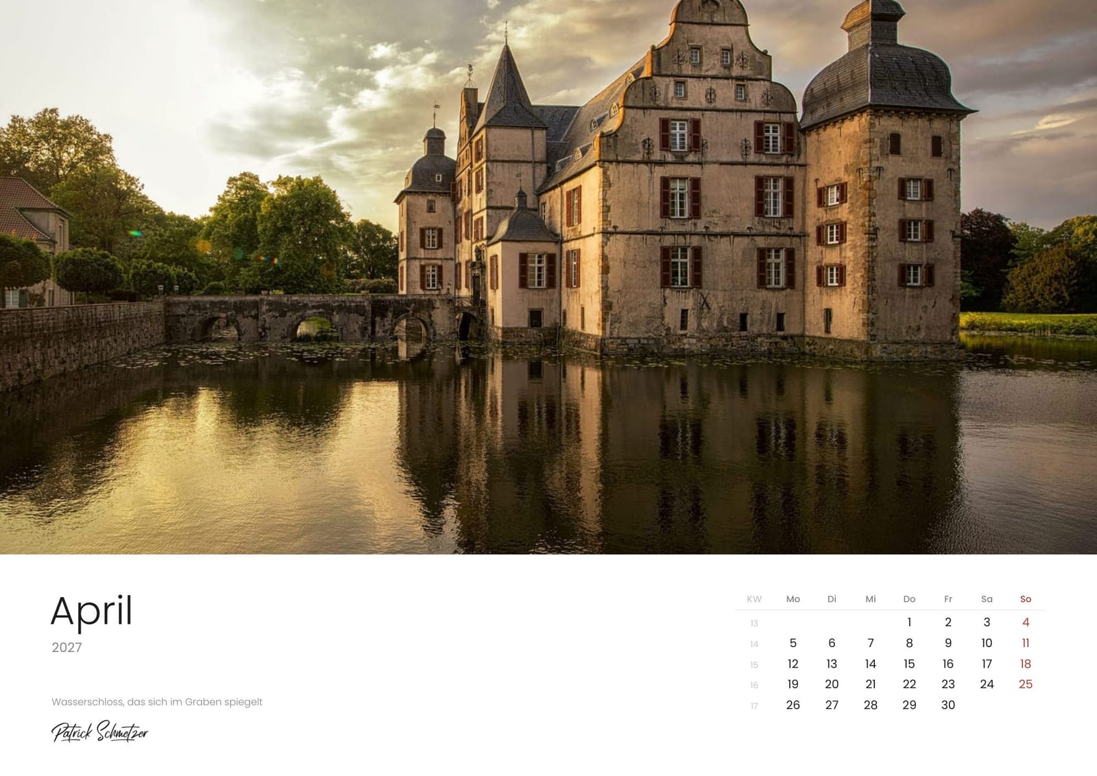 Calendar page April 2027: A moated castle mirrored in its water